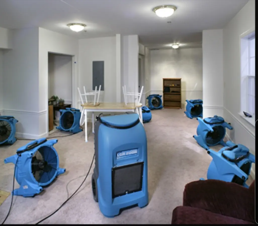 Air movers and dehumidifier setup for Water Damage Restoration in Pahokee