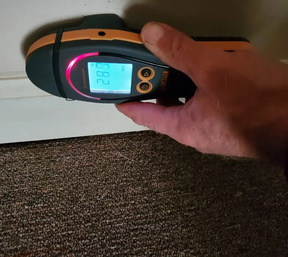 Moisture detection at baseboard during Mold Inspection & Testing in Pahokee